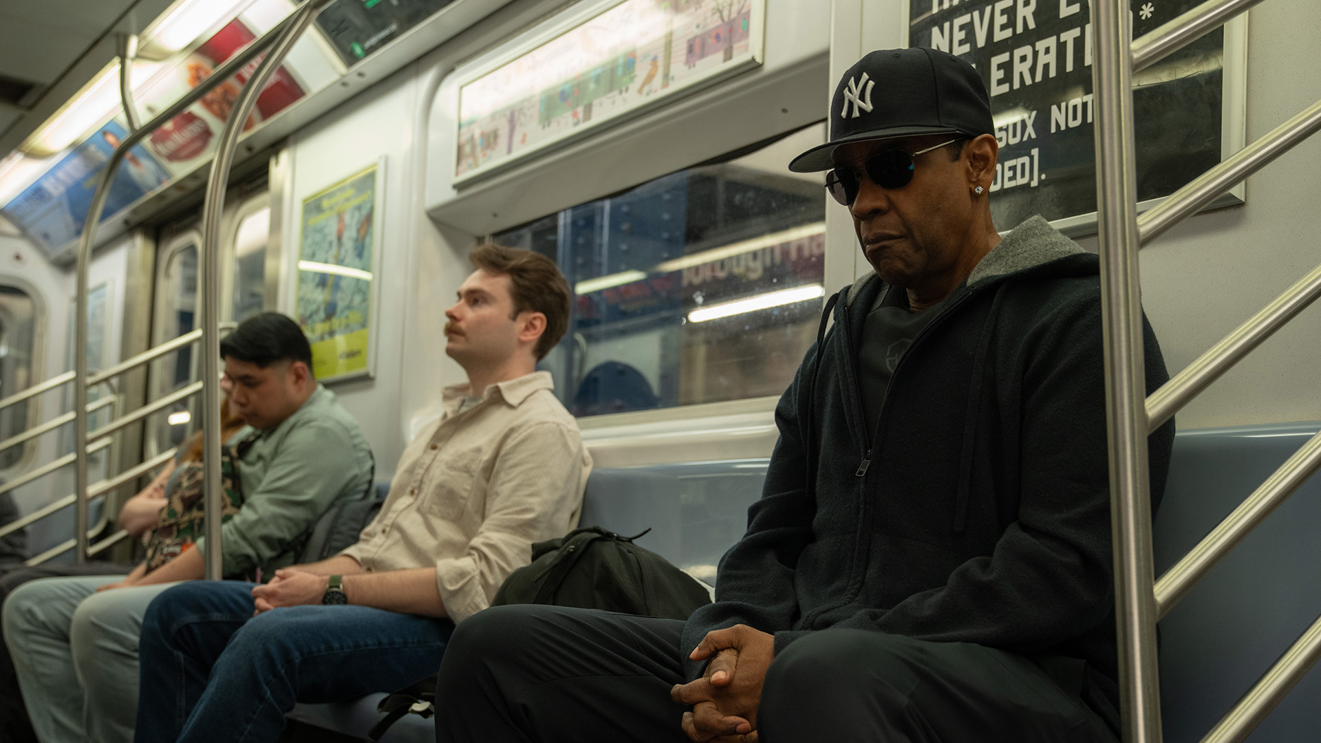 Denzel Washington as David King, on the subway, in Highest 2 Lowest.