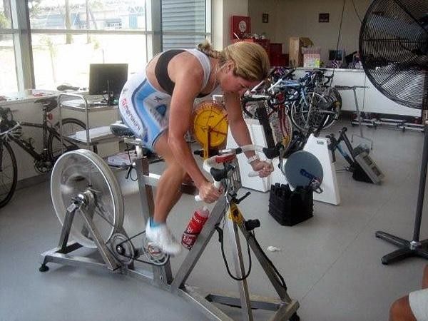 Sprinting out of the saddle.