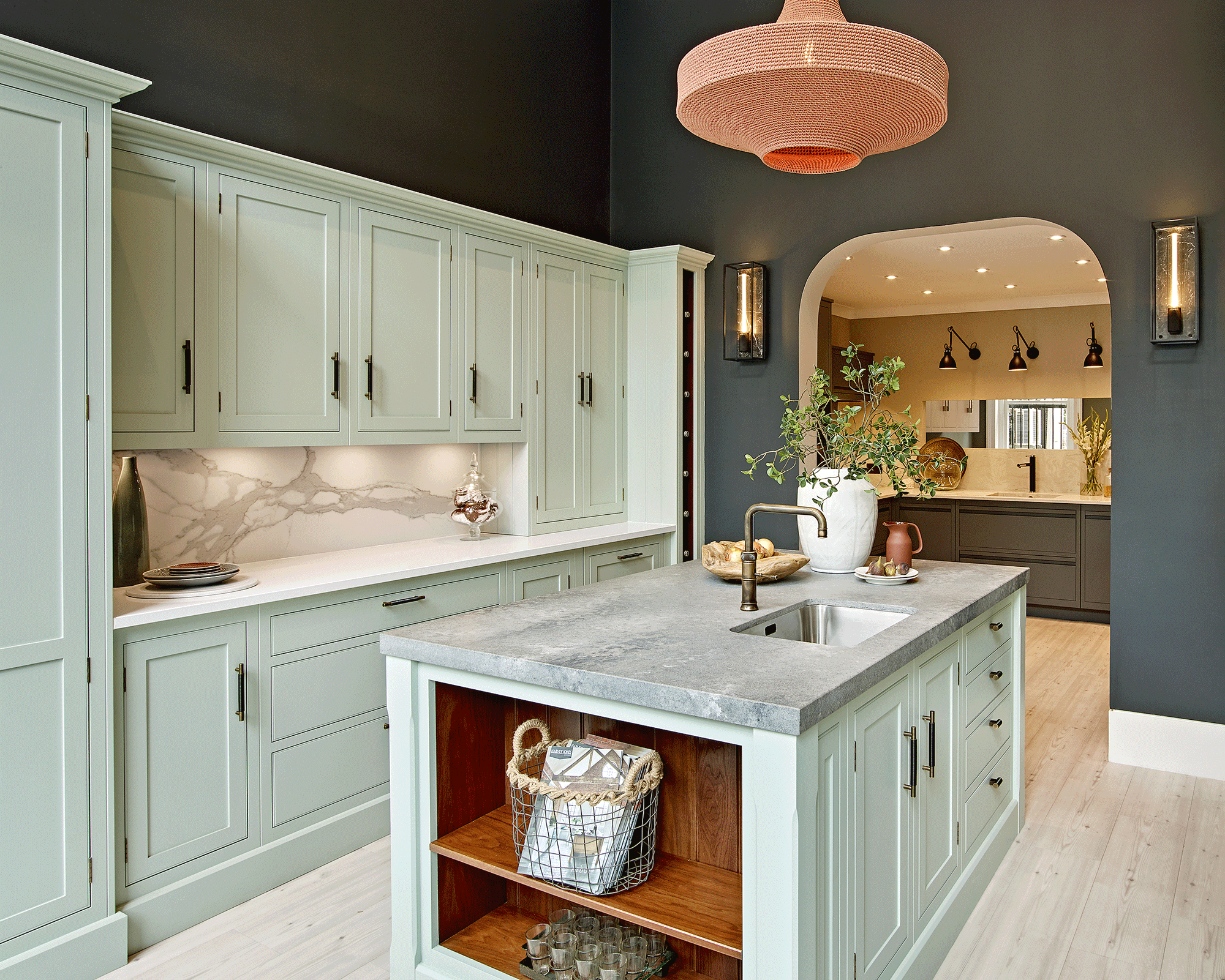 Pale green kitchen with island