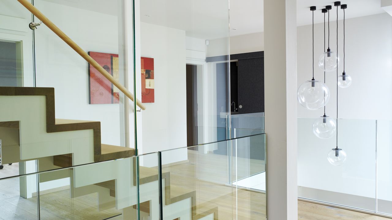 modern landing with glass balustrade