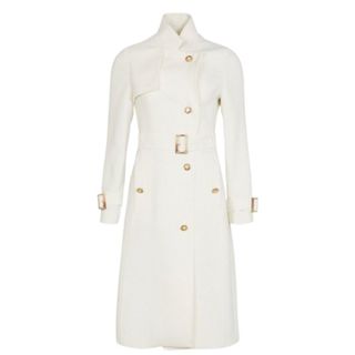White trench coat with gold detailing
