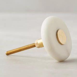 A marble and gold doorknob from Anthropologie