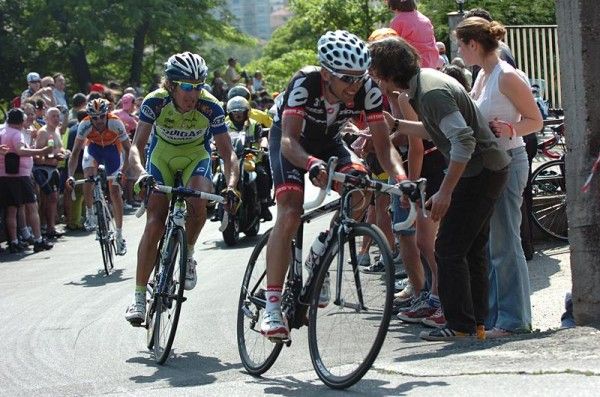 The chasing trio was far distant as Di Luca crossed the line. (Cervelo) chase after Di Luca.
