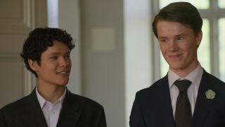 Simon smiling at Wilhelm in the Palace in Young Royals Season 3