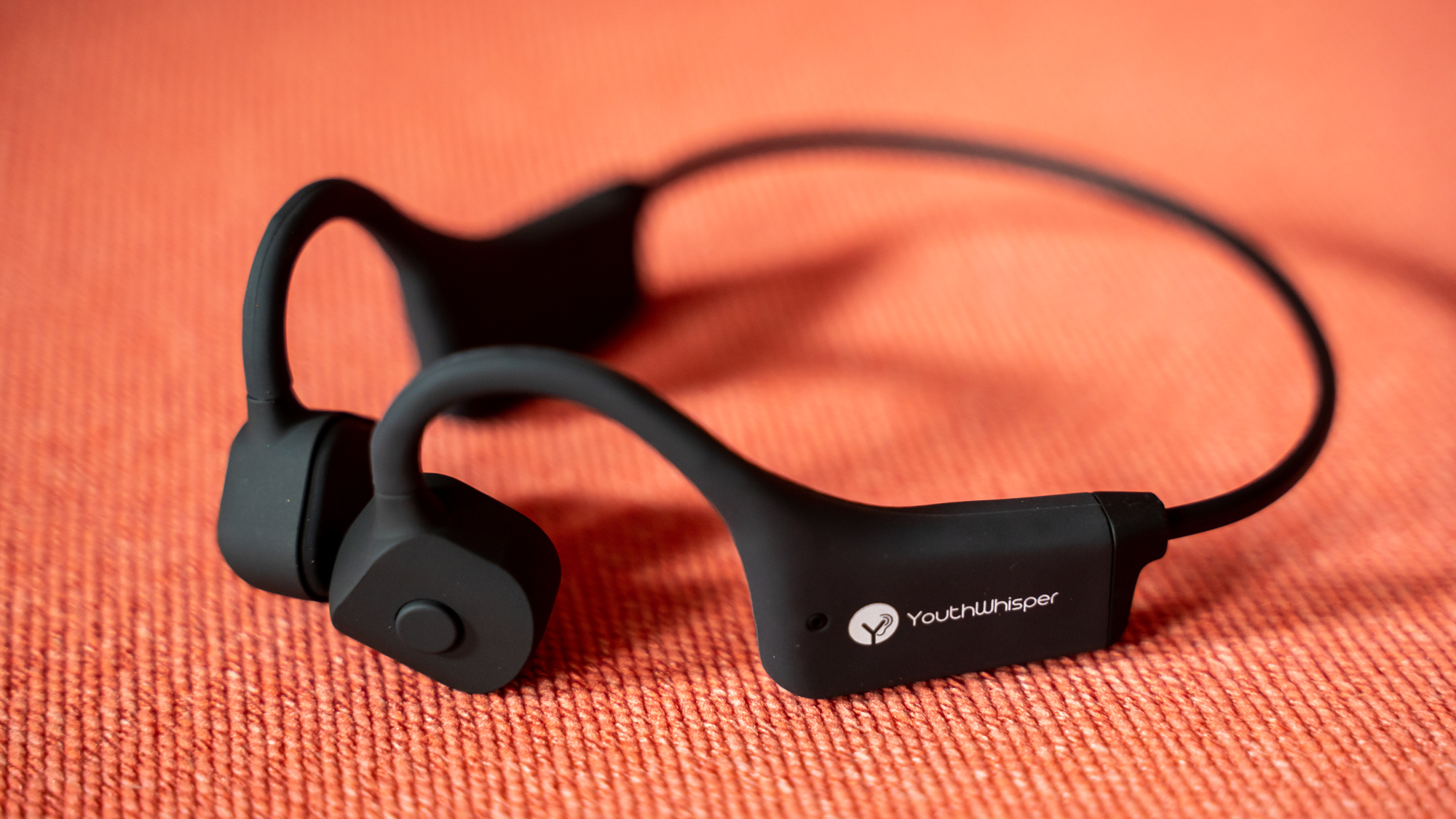 YouthWhisper SuperQ3 on a cloth surface