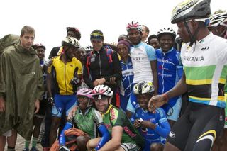 Local cyclists pose with the Tinkoff-Saxo riders before their climb of Kilimanjaro