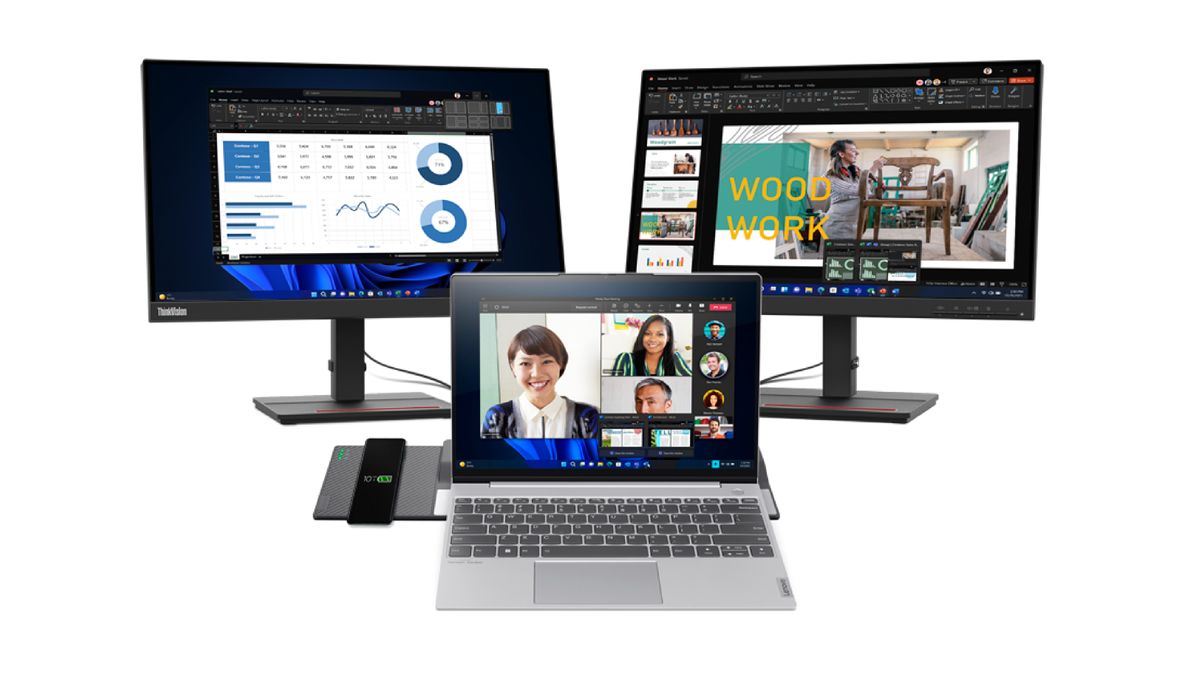 Lenovo Wireless Dock for ThinkBook 13x (Gen 2), with laptop docked, two monitors connected, and phone charging, seen from front..