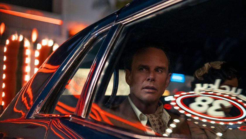 Cooper looking at the Lucky 38 Casino from the inside of a car