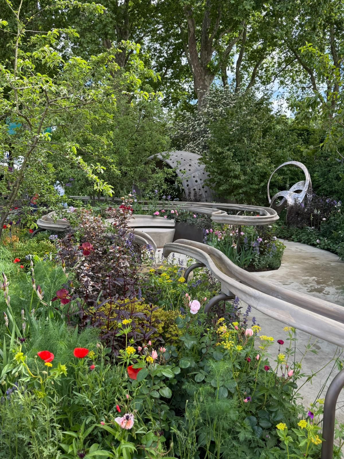 Images of the Parkinson's garden, richly planted and sensory, to reflect some of the symptoms of the disease