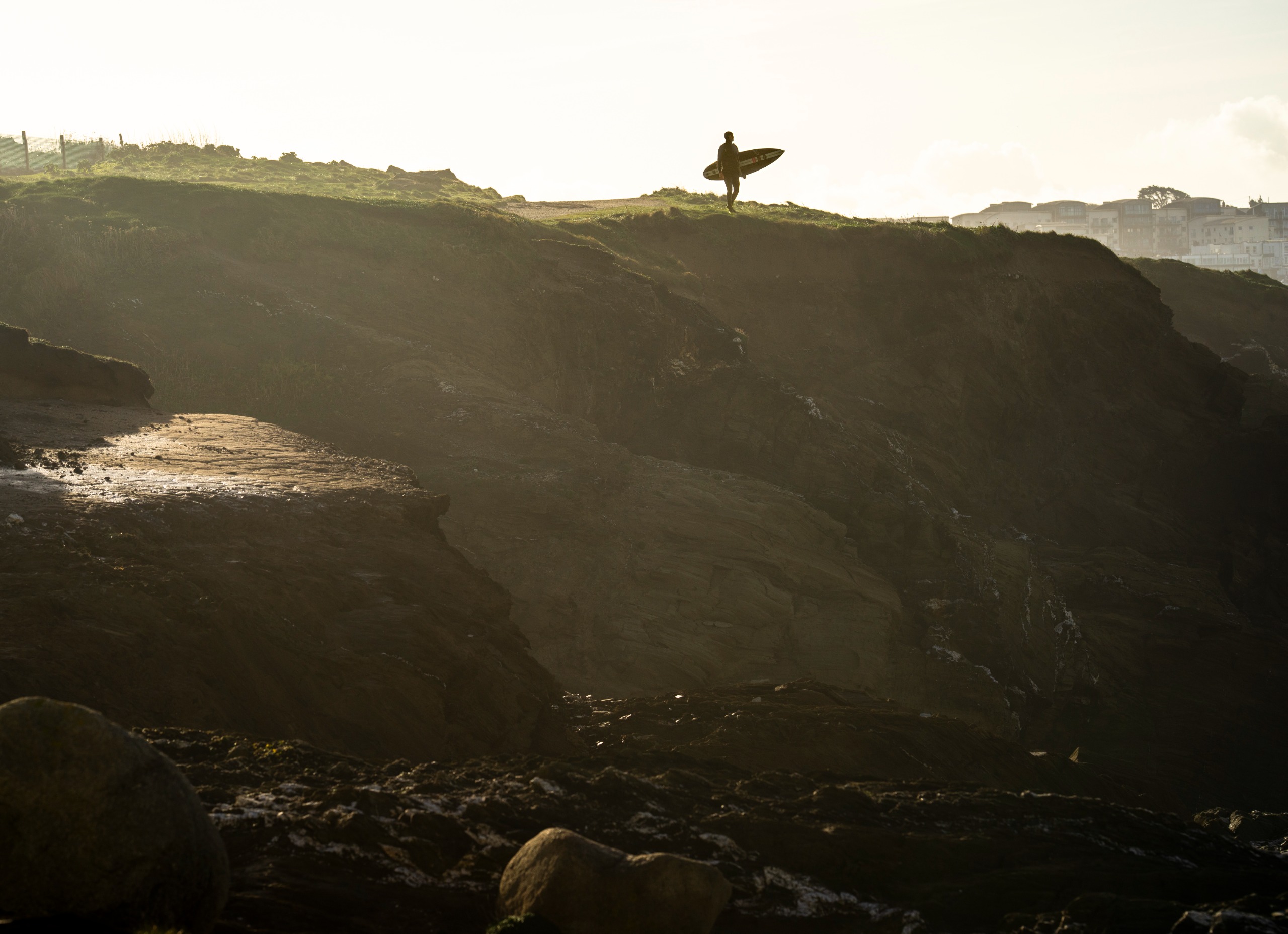 Tom Butler looks back towards the Atlantic from the cliffs above the Cribbar after several hours in the water
