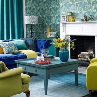 living room with Seaweed wallpaper and Oscar sofa in Cobalt Smart Velvet