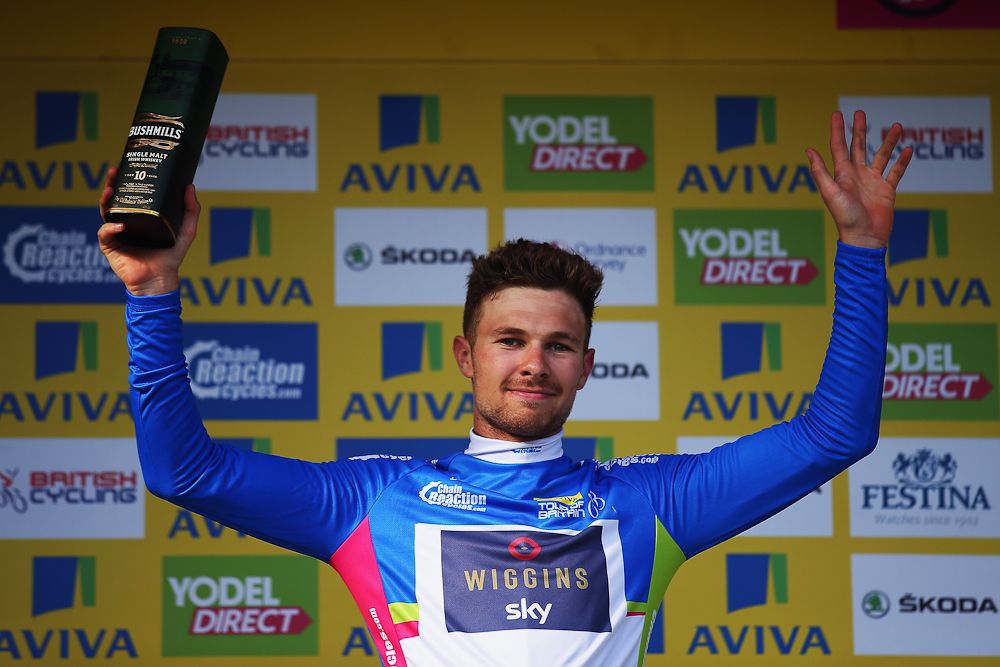 Owain Doull in the blue jersey on the stage 7 podium.