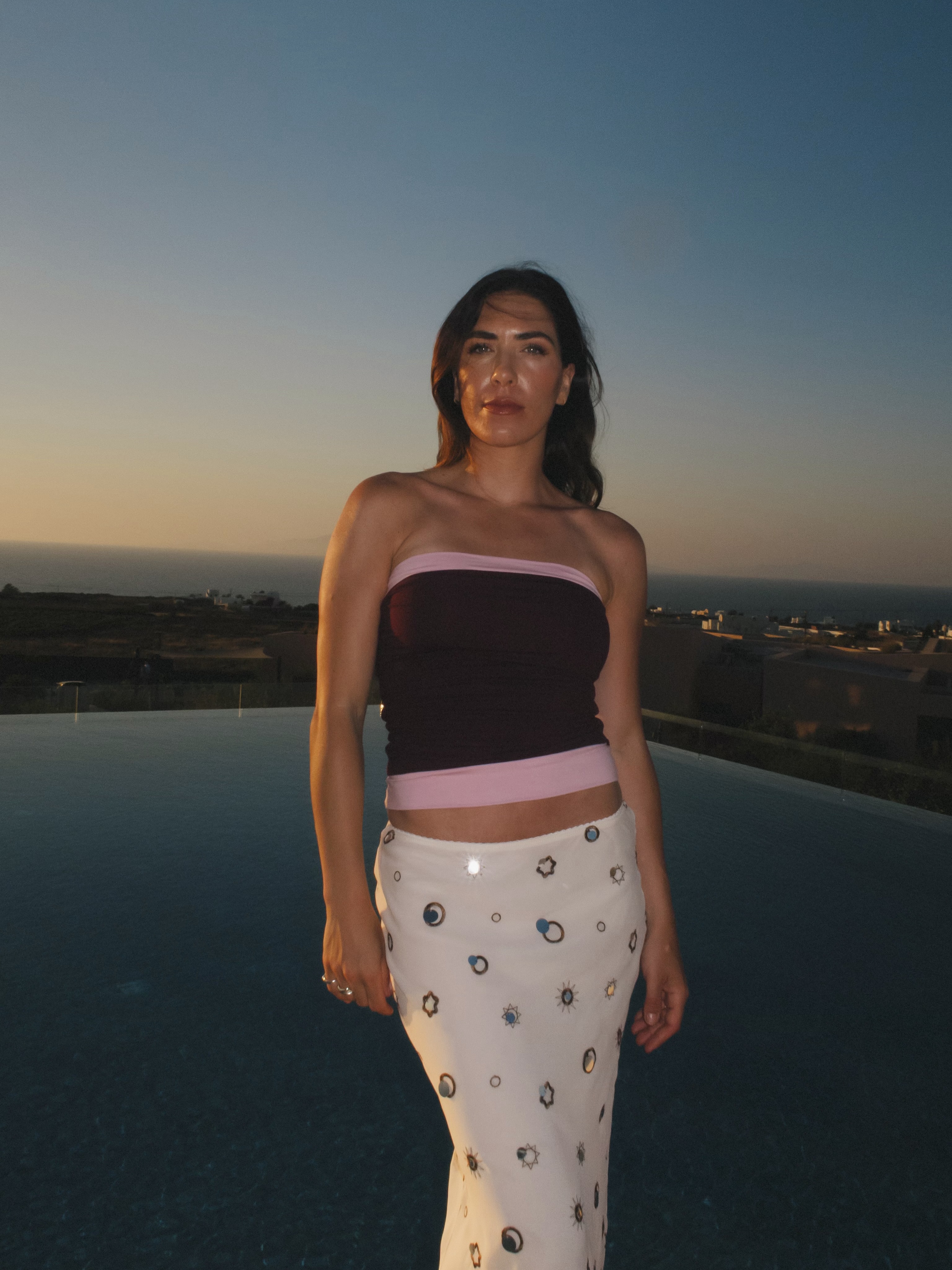 A woman wearing beaded skirt trend for summer 2026.