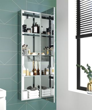 Mirrored Bathroom Cabinet on teal tiled wall