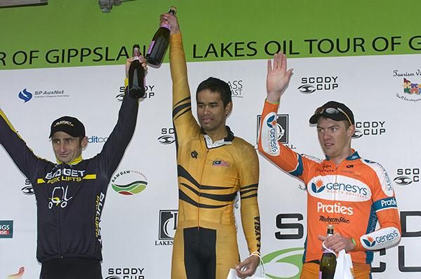 The stage eight podium (l-r): Rico Rogers (2nd,Budget Forklifts), Harrif Saleh (1st,Malaysian National Team), and Ben Grenda (3rd,Genesys Wealth Advisers).
