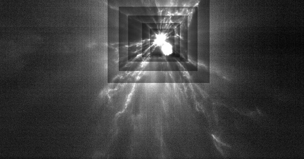 An image taken from LICIACube shows the plumes of ejecta streaming from the Dimorphos asteroid shortly after the DART impact.