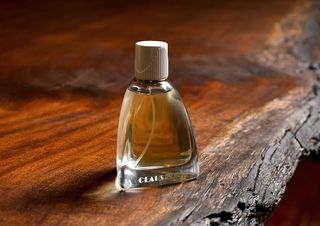 The cologne’s handmade glass flacon is in the shape of an ink bottle