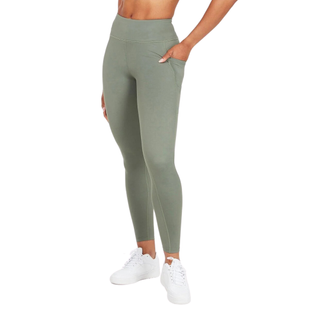woman wearing green leggings with her hand in the side pocket