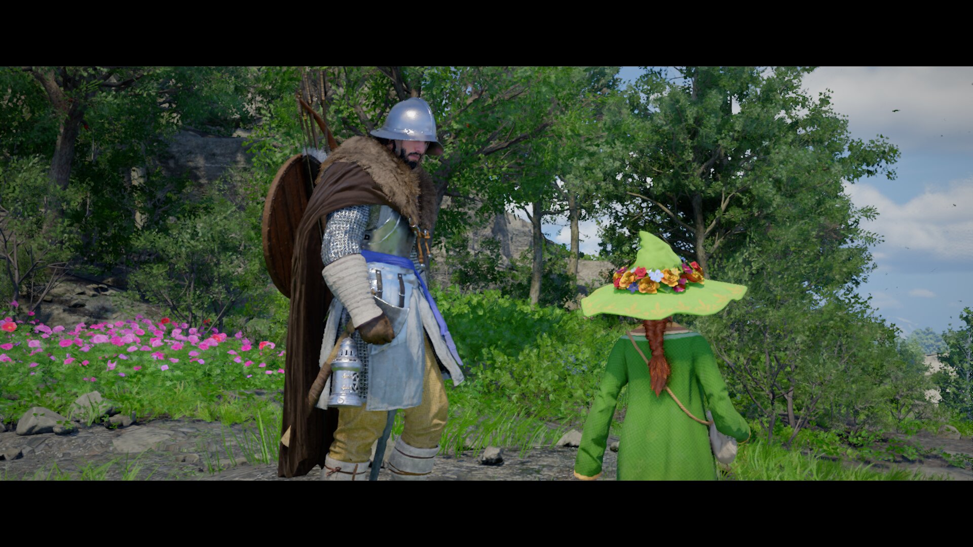 Crimson Desert screenshot of Kliff talking to a child in green robes and a flowery witch-like hat.