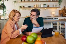 Older couple discussing a budget 