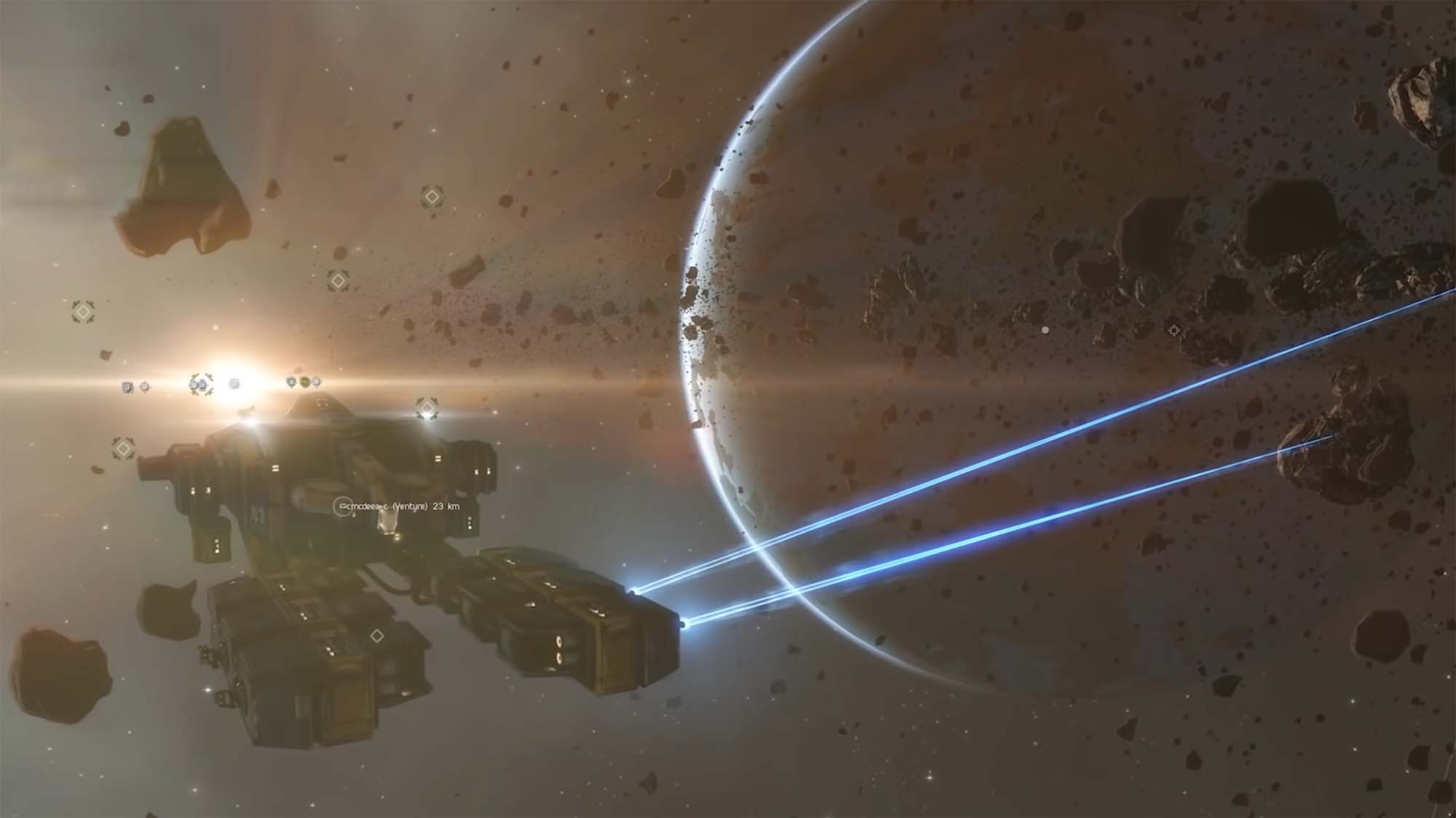 A mining frigate mining an asteroid in EVE Online