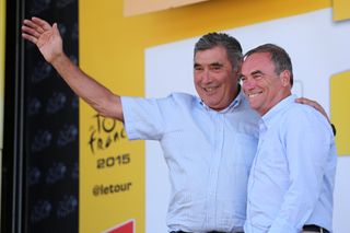 Bernard Hinault and Eddy Merckx on the Tour de France podium in 2015