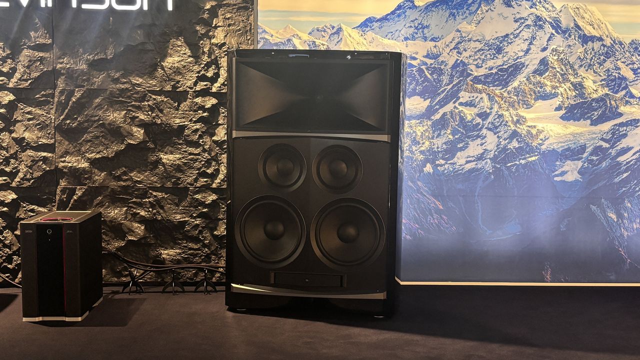 JBL Summit Everest loudspeaker next to a mountainous backdrop