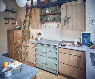 bare wood kitchen with pale green Everhot range cooker