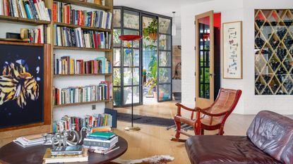 Living room with open book shelves