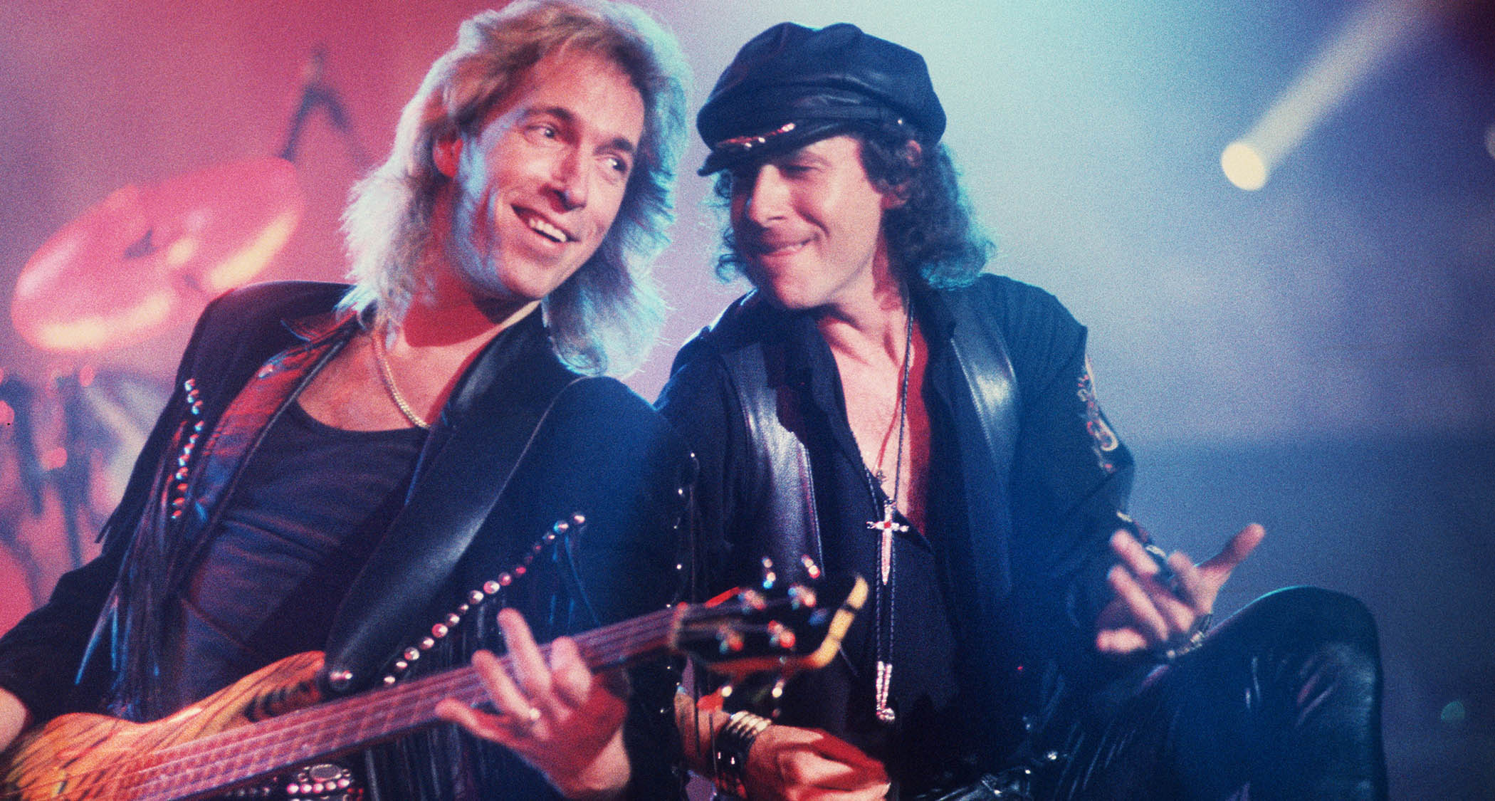 The late Francis Buchholz [left] leans into Klaus Meine in this photo from the Scorpions' 1991 performance in Gent, Belgium.