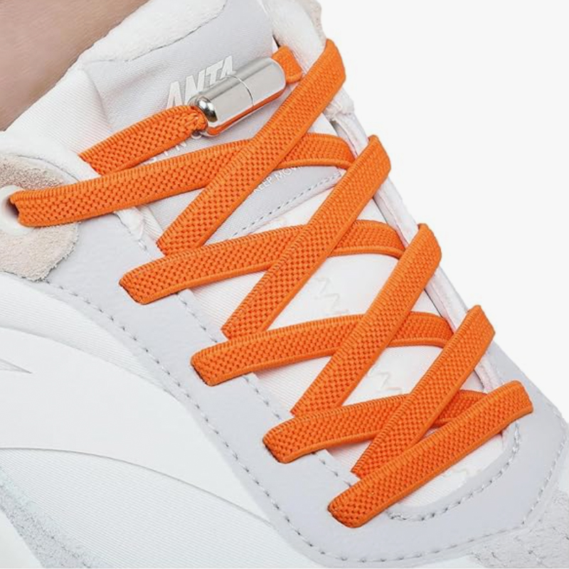 orange elasticated shoe laces close up