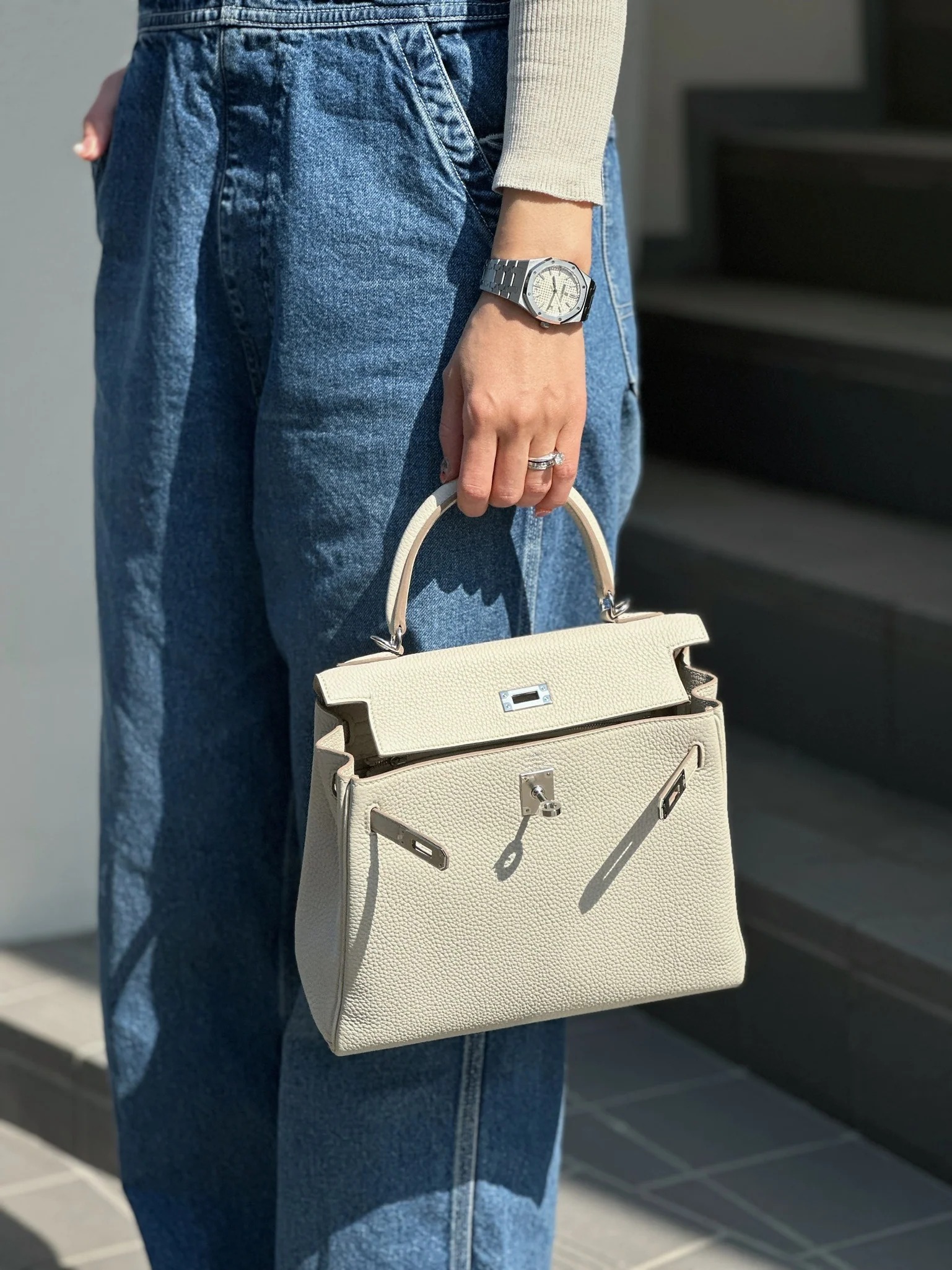 Photo of woman wearing best vintage bag from Tokyo store.