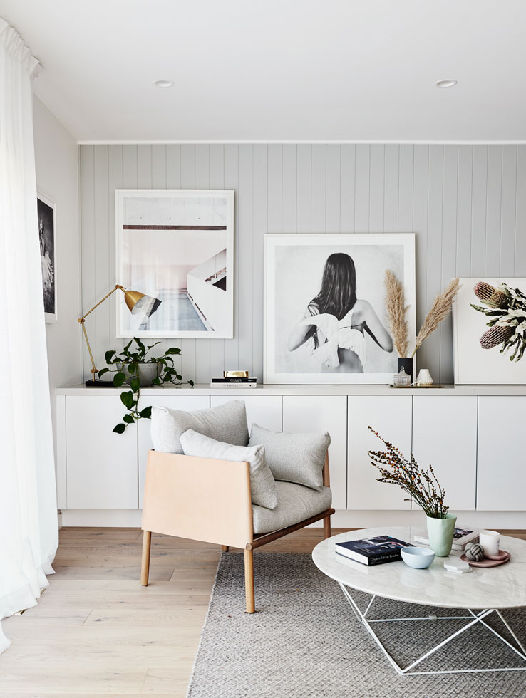 living room with wall panelling and sideboard