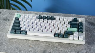 The Keychron Q1 HE magnetic keyboard in white and green