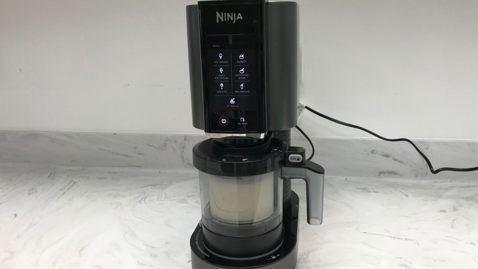 Ninja Creami on its own on a kitchen countertop