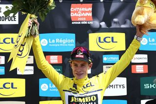 Overall race winner Jonas Vingegaard (Jumbo-Visma) celebrates on the podium of the Criterium du Dauphine