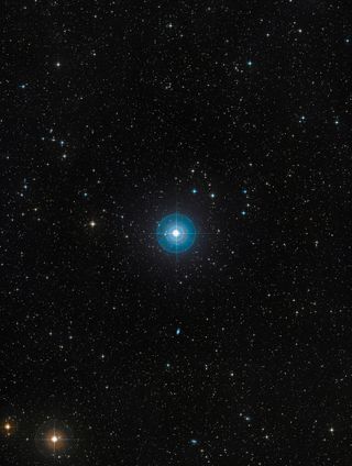 The star Beta Pictoris (center) is located 63 light-years from Earth in the constellation Pictor, the Painter, and is about 12 million years old and 75-percent more massive than our sun. Image from the European Southern Observatory's Digitized Sky Survey
