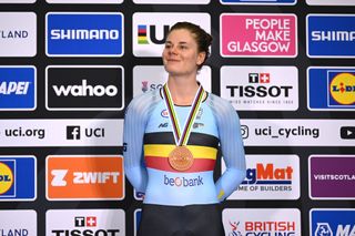 Lotte Kopecky on the podium with her bronze medal in the Omnium at the 2023 Cycling World Championships in Glasgow
