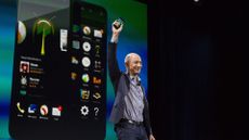 Amazon Fire Phone launch 2014 &ndash; Jeff Bezos holds up Amazon's failed smartphone