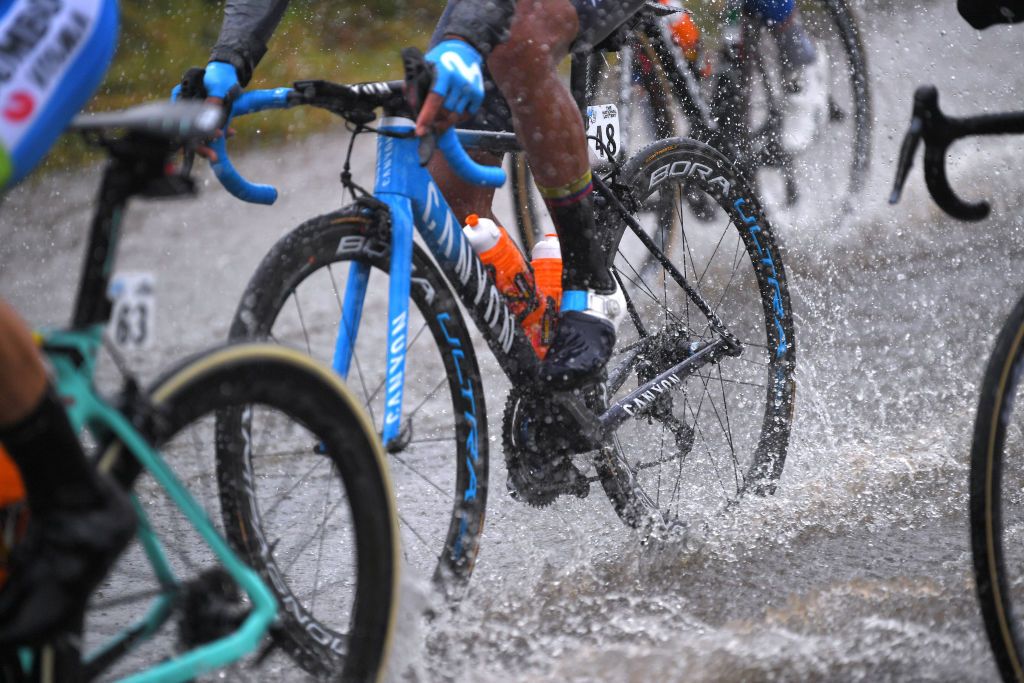 Colombia's Nairo Quintana bravely goes bare-legged in the atrocious conditions