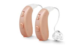 Best hearing aids: MDHearingAid AIR Hearing Aid in pink-beige with a clear tip