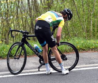 Geraint Thomas makes a wheel-change on stage two of the 2015 Tour de Romandie