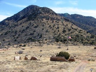 The howling winds that still ripple the flag above the abandoned parade grounds of Fort Bowie help visitors sense the remoteness of this place along Apache Pass. The hot summers and cold winters and the transitional flora and fauna from two vast deserts a