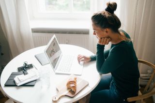 Woman blogging from home, one of the best work from home jobs