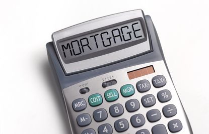 Mortgage written on a calculator.