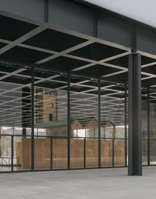 from outside looking into grid ceiling at Neue Nationalgalerie refurbishment by David Chipperfield in Berlin