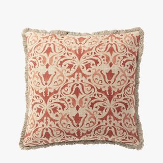 red and beige patterned square cushion