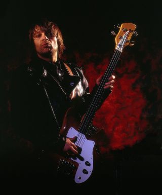 Mani with Rickenbacker 3000 bass