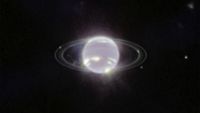 a blue and white orb on a black background
