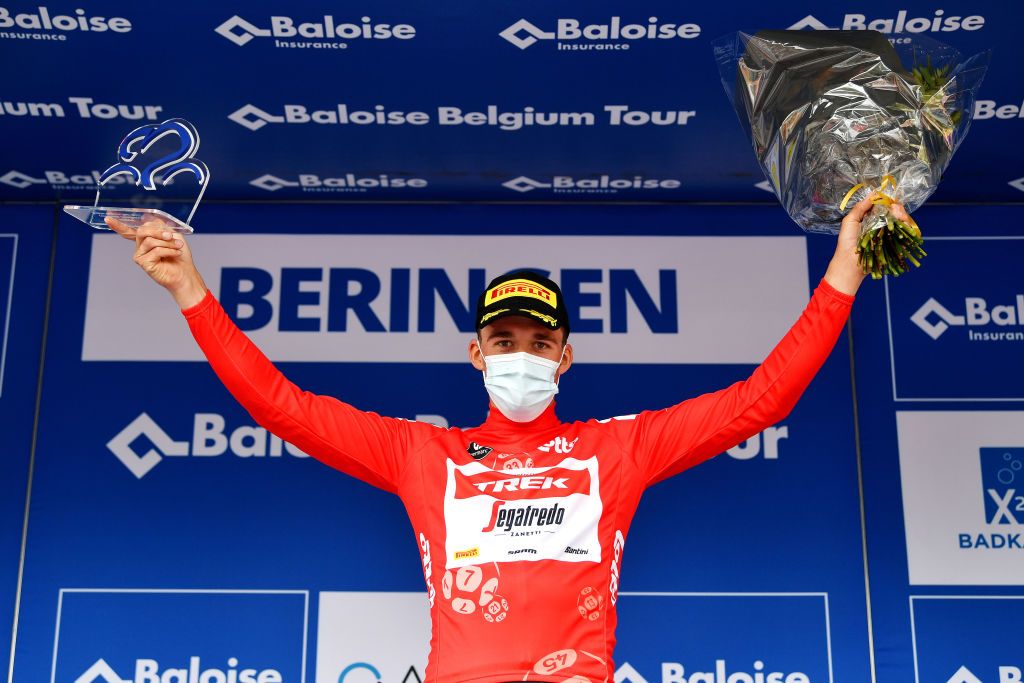 BERINGEN BELGIUM JUNE 19 Mads Pedersen of Denmark and Team Trek Segafredo celebrates winning the red points jersey on the podium ceremony after the 91st Baloise Belgium Tour 2022 Stage 5 a 1799km stage from Gingelom to Beringen BaloiseBelgiumTour on June 19 2022 in Beringen Belgium Photo by Luc ClaessenGetty Images